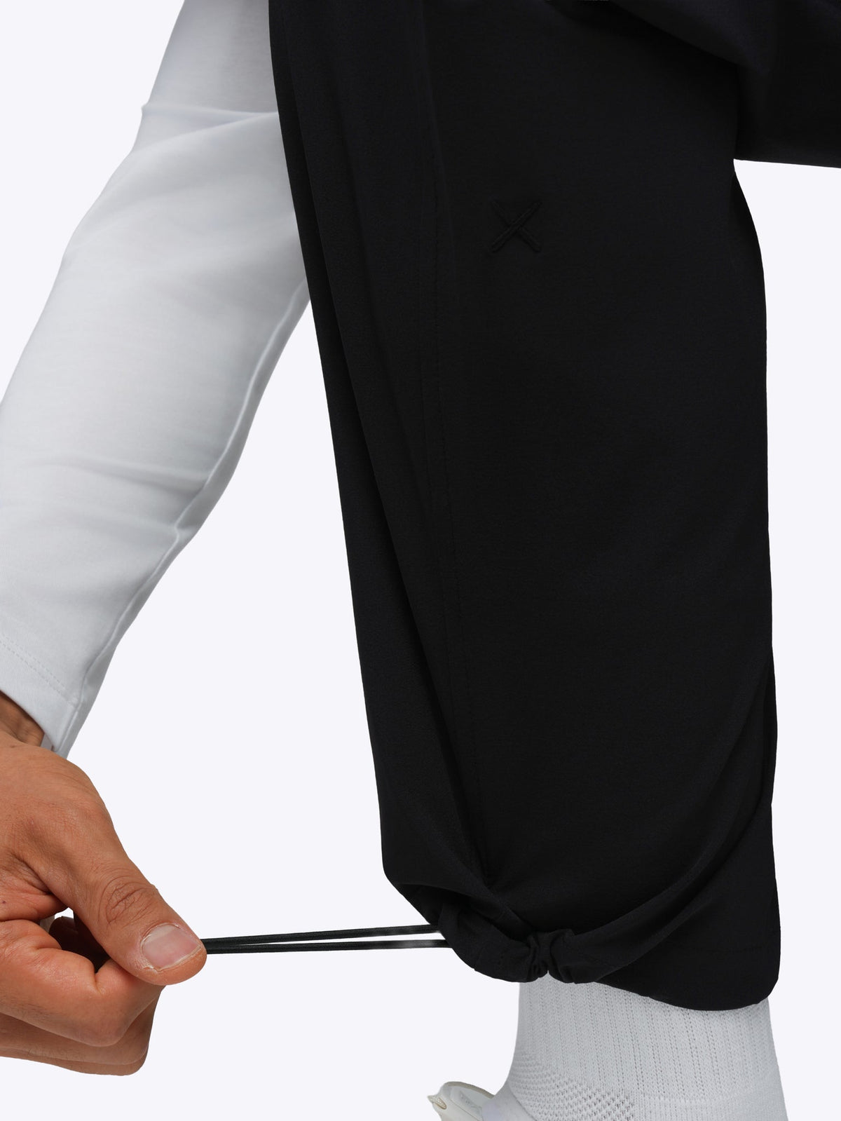 Men's Modern Slim Tech Trousers – Matte 4-Way Stretch Fabric, Hidden Cuff Cinch, Back Zip Pocket | Black