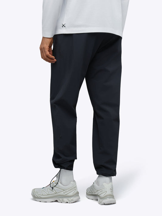 Men's Modern Slim Tech Trousers – Matte 4-Way Stretch Fabric, Hidden Cuff Cinch, Back Zip Pocket | Obsidian