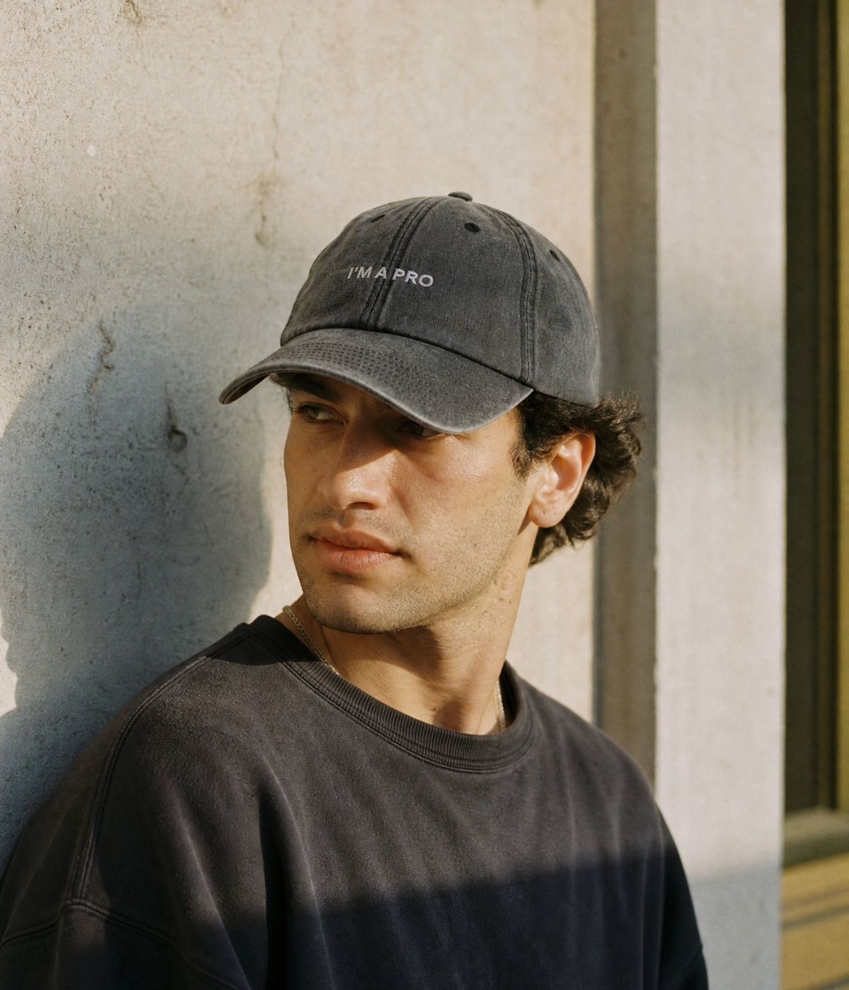 A Pro Men's Washed Cotton Baseball Cap – Embroidered Slogan, Low-Profile Unstructured Fit, Adjustable Strap