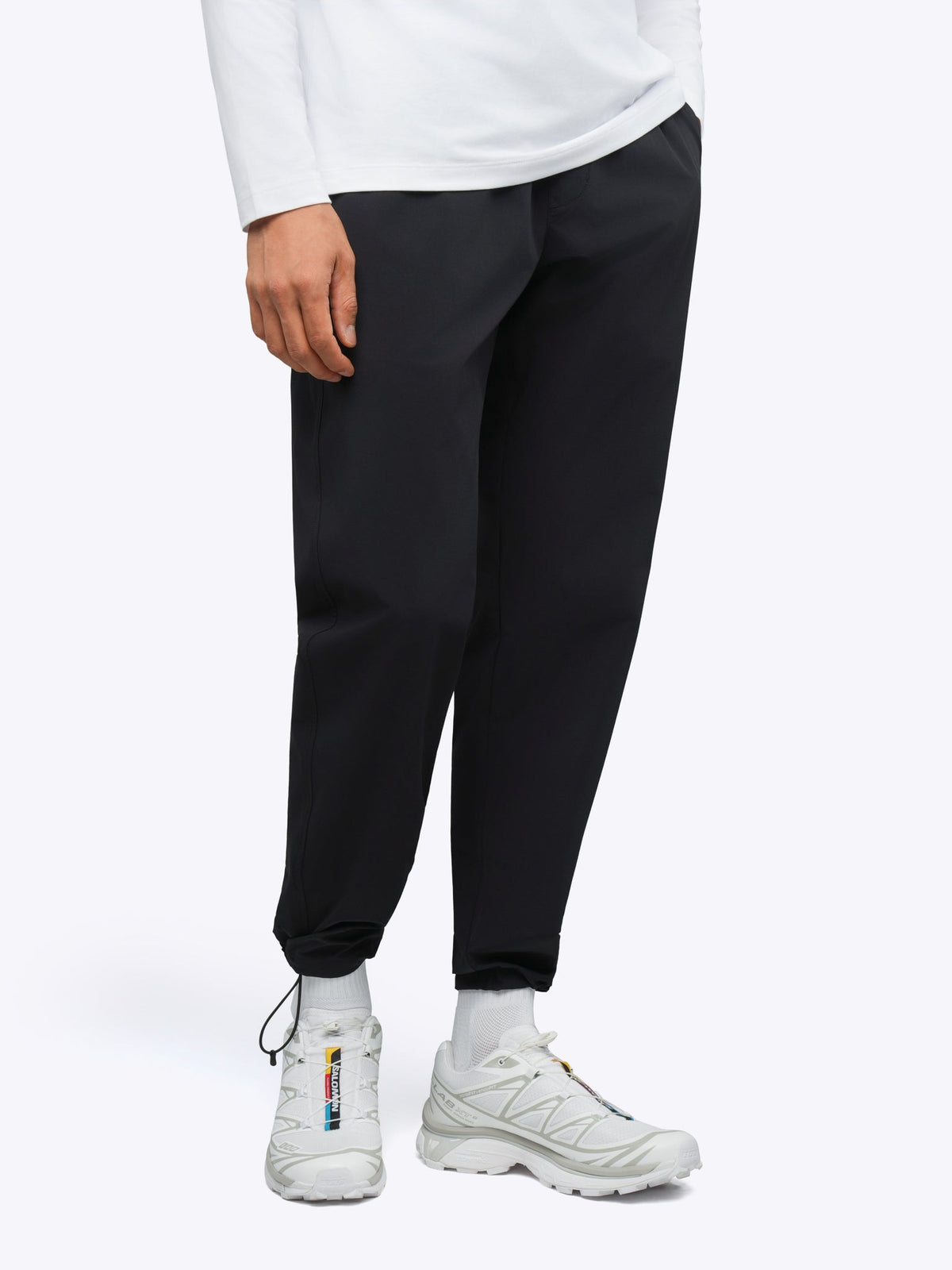 Men's Modern Slim Tech Trousers – Matte 4-Way Stretch Fabric, Hidden Cuff Cinch, Back Zip Pocket | Black – view 4
