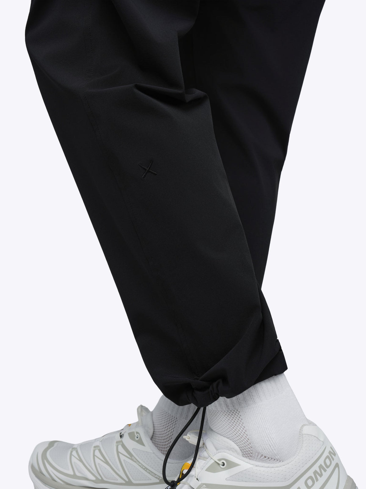 Men's Modern Slim Tech Trousers – Matte 4-Way Stretch Fabric, Hidden Cuff Cinch, Back Zip Pocket | Black – view 8